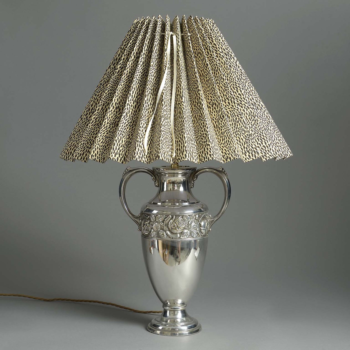 Silver plated table lamp with leopard print shade